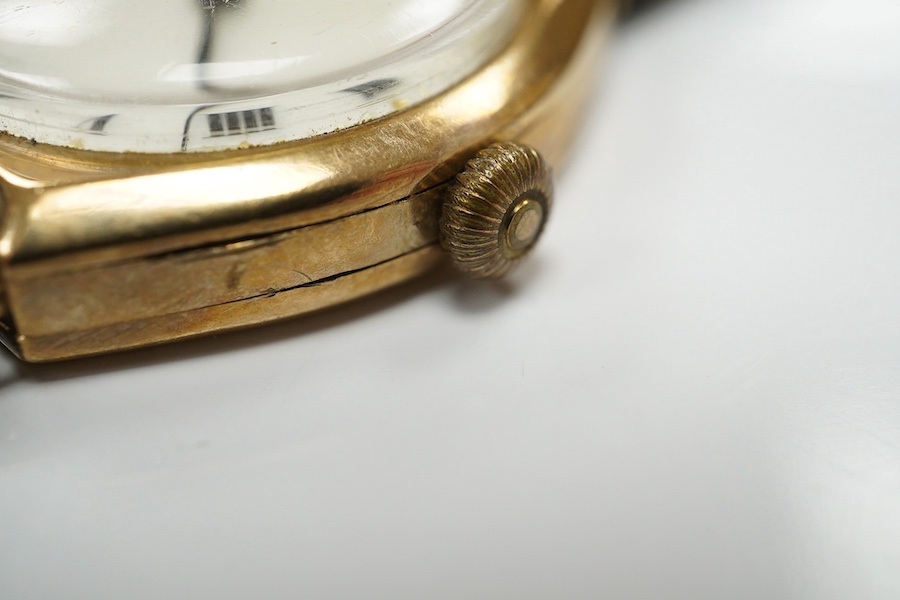 A gentleman's 1950's 9ct gold manual wind wrist watch, with Roman dial, signed Rolex movement, with Aaron Lufkin Dennison case, case diameter 29mm, on an associated leather strap. Condition - poor